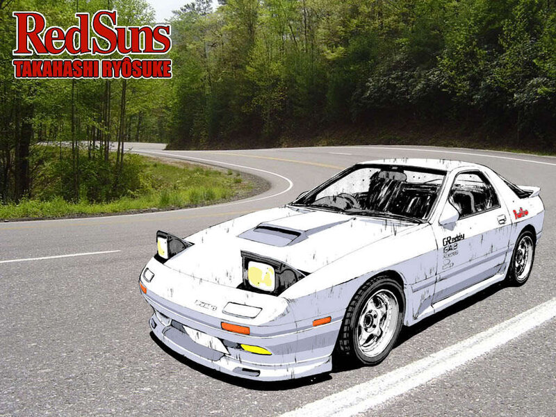 White sports car on winding road