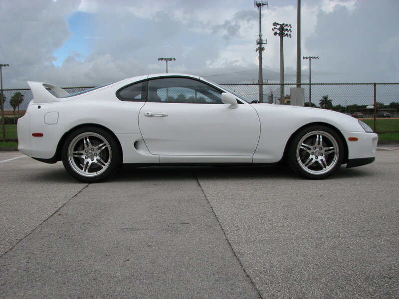 white sports car parked