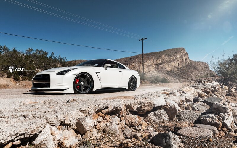 White Sports Car — Power Lines