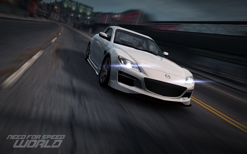 White sports car racing at night