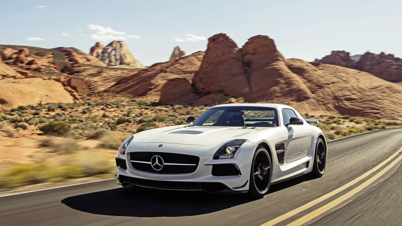 White Sports Car — Rock Formations