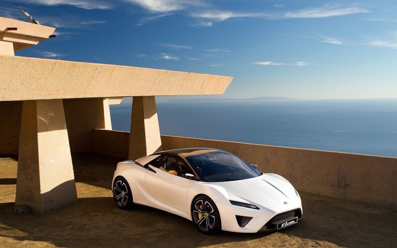 White Sports Car — Serene, Afternoon, Photograph, Ocean