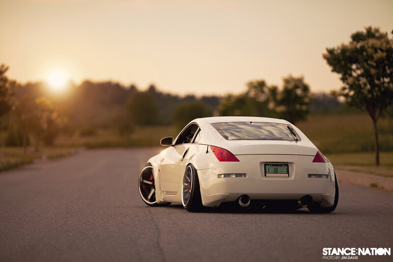 White Sports Car — Serene, Sunset, Photograph, Road