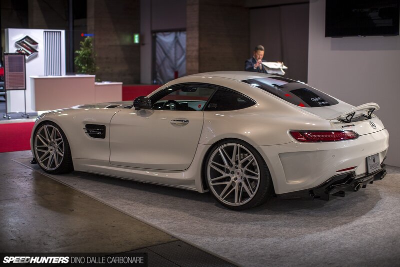 White Sports Car — Showroom, Photograph, Man