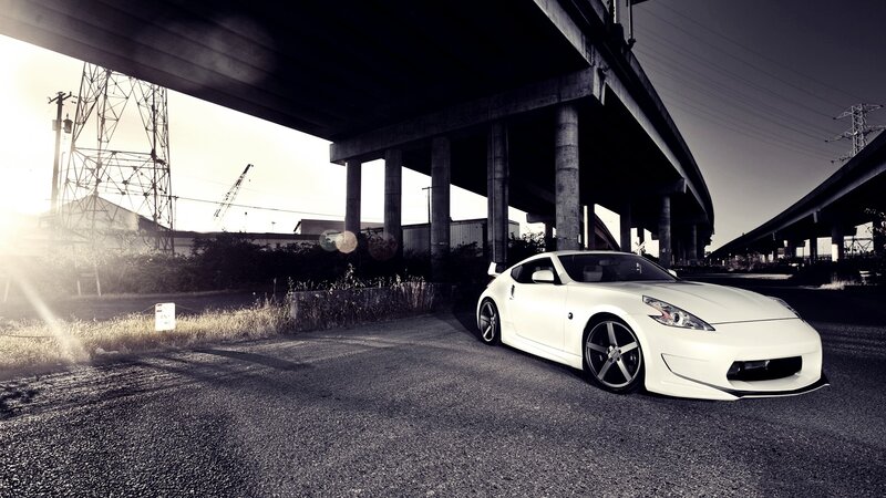 White sports car under highway