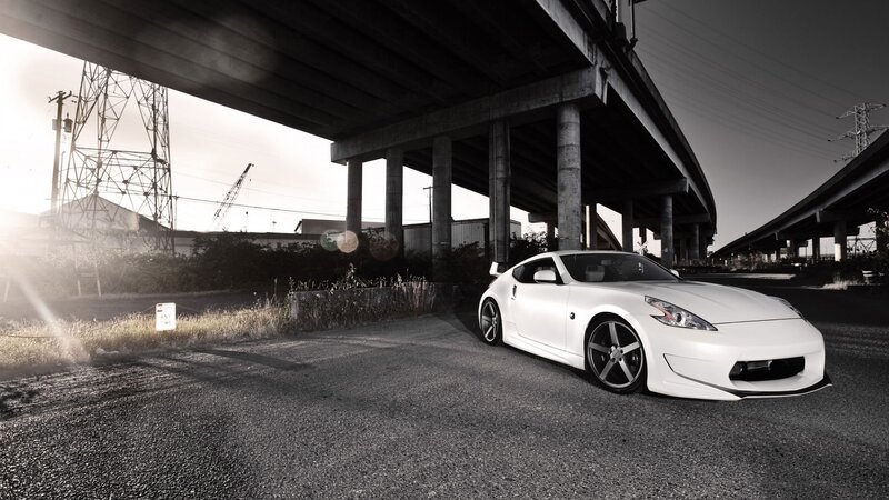 White sports car under highway