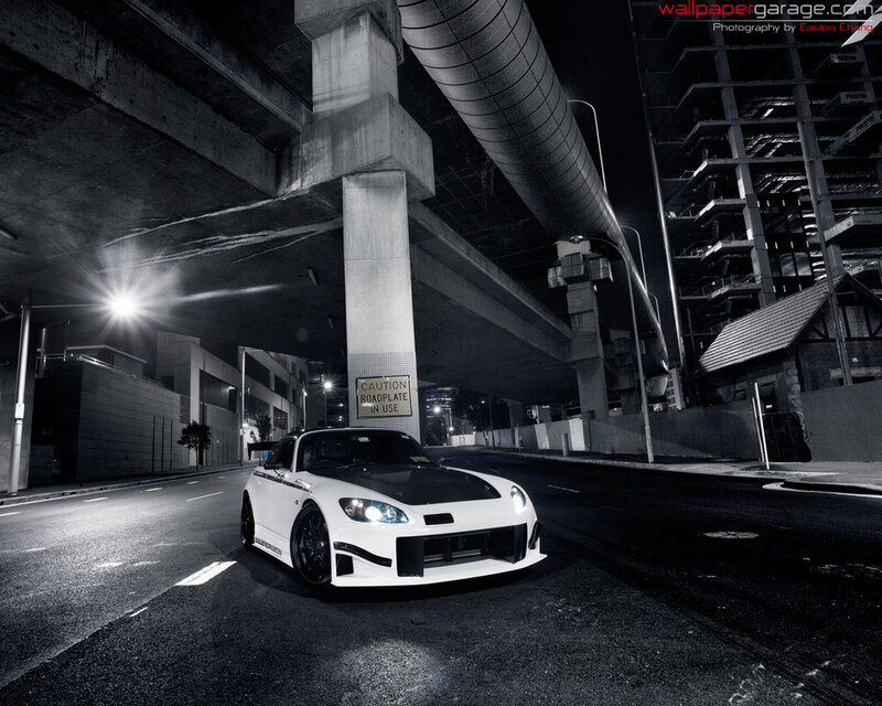 white sports car under overpass