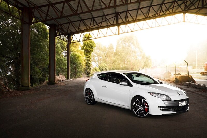 White sports car under shelter