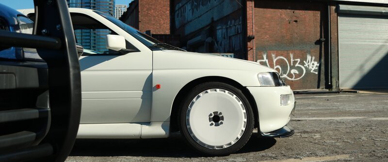 White Sports Car — Urban, Afternoon, Photograph, Graffiti