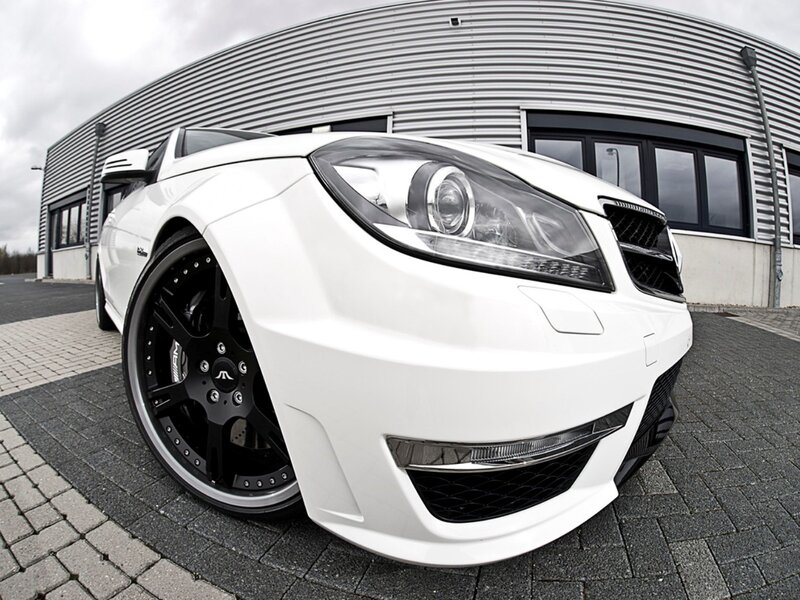 white sports car with black rims