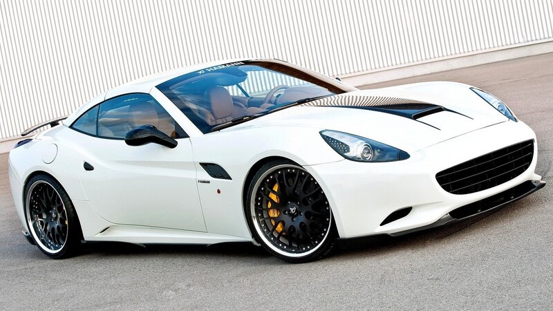 white sports car with black wheels