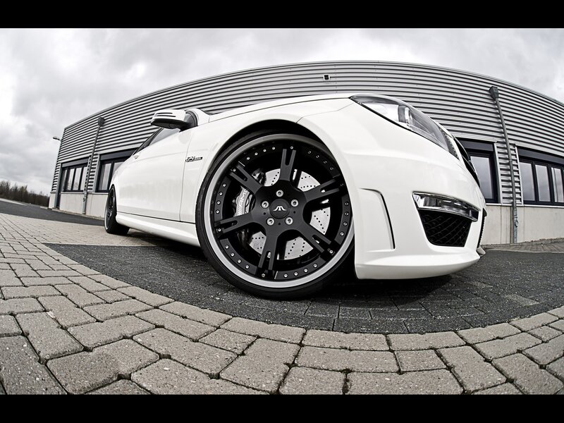 white sports car with black wheels