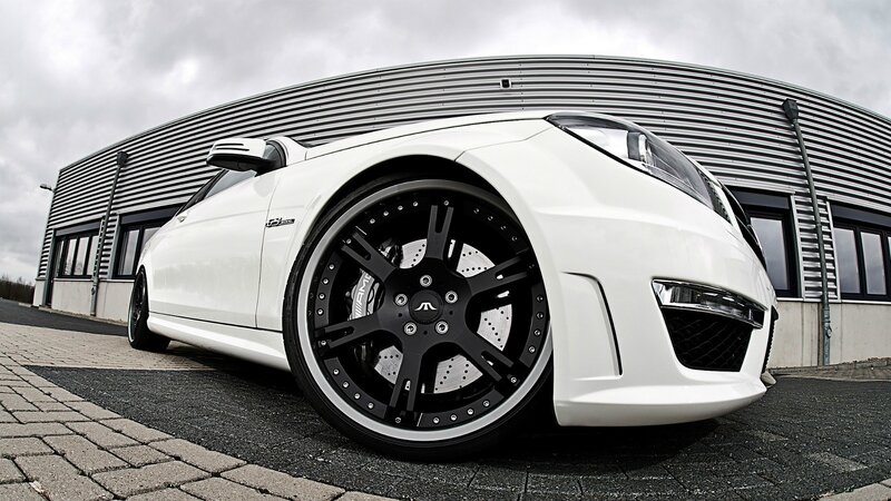 white sports car with black wheels