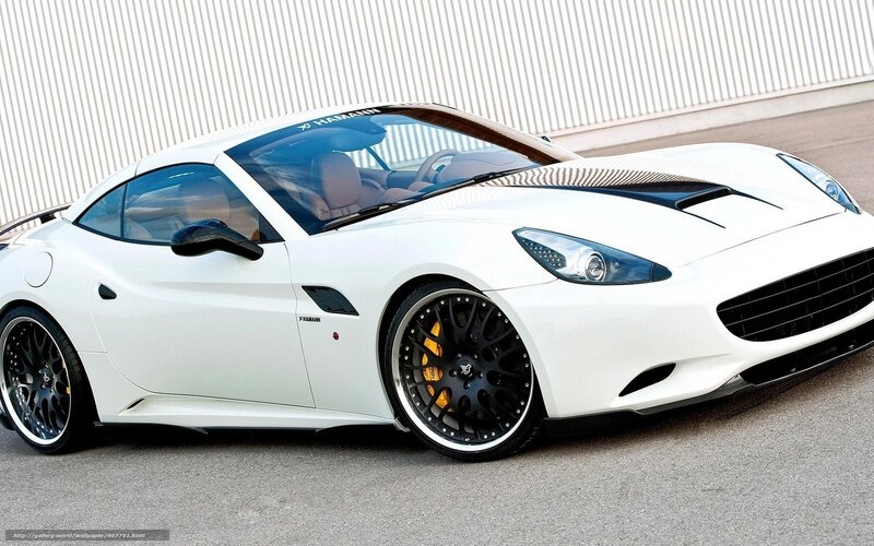 white sports car with black wheels
