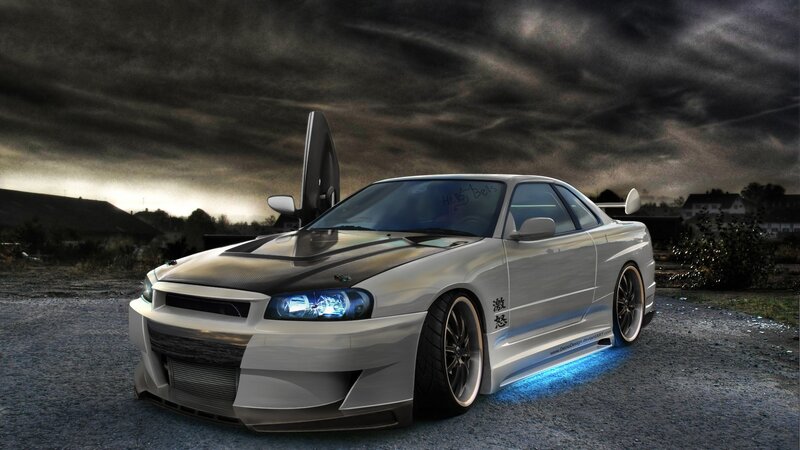 white sports car with blue lights