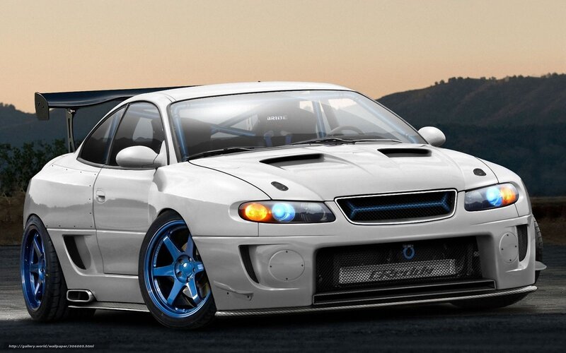 white sports car with blue wheels
