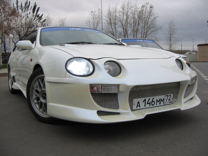 white sports car with custom front bumper