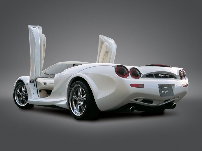 white sports car with doors open