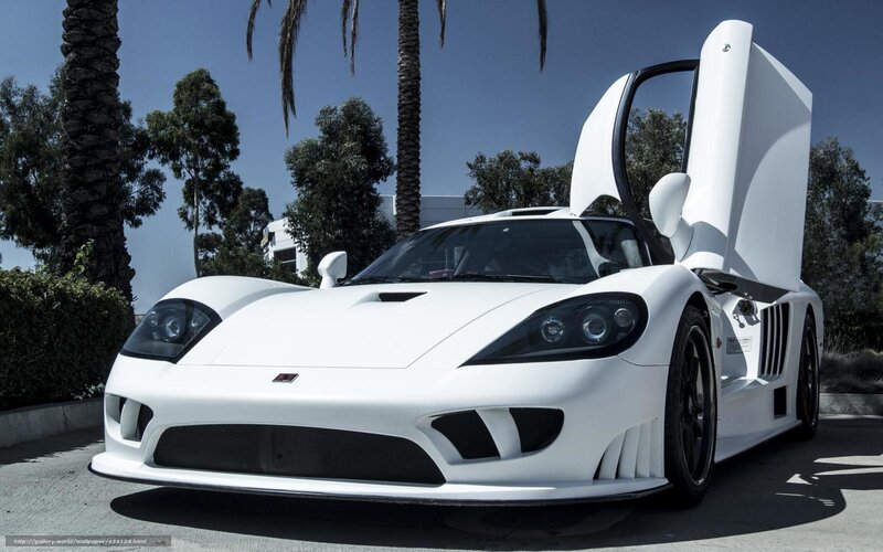 white sports car with doors open