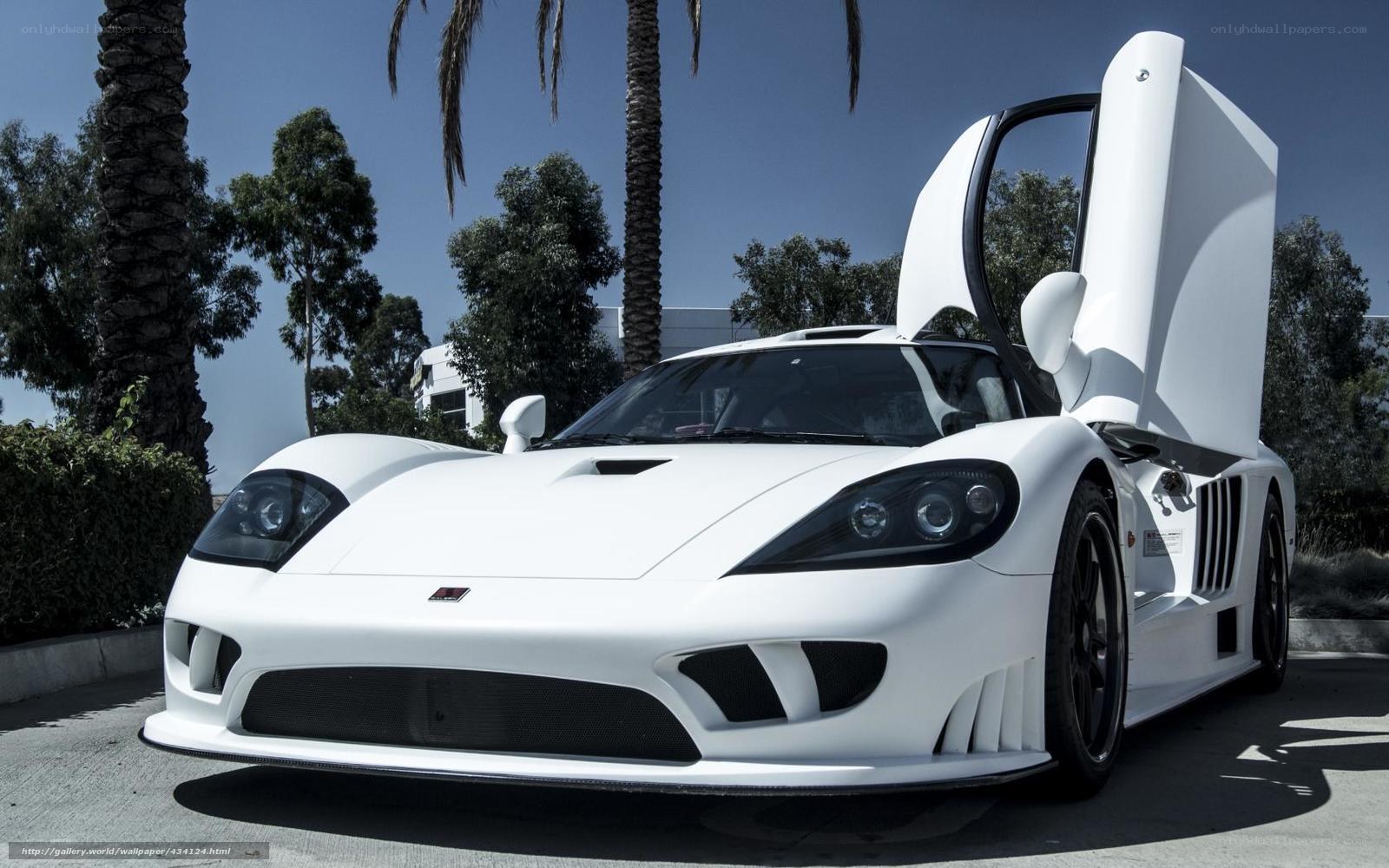 white sports car with doors open