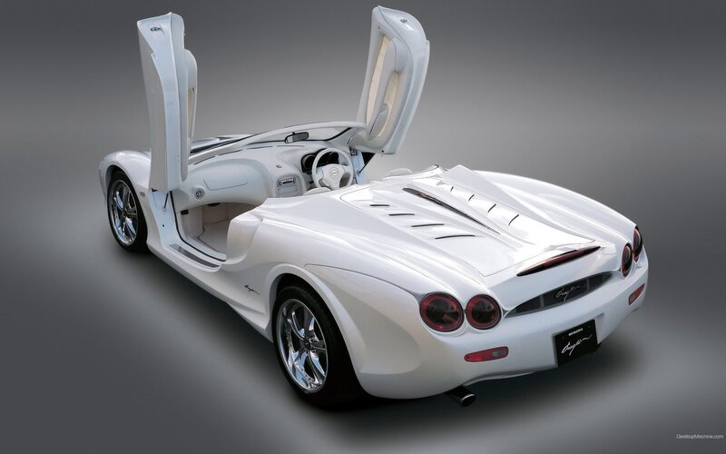 white sports car with doors open
