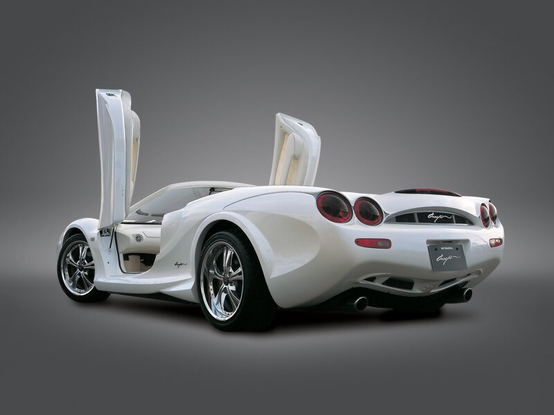 White sports car with doors open