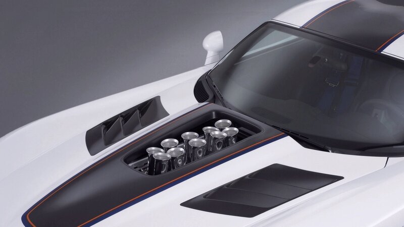 white sports car with engine vents