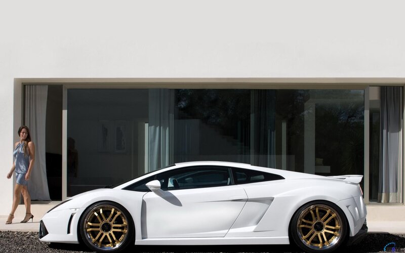 White sports car with gold wheels