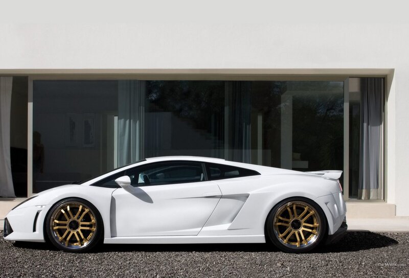white sports car with gold wheels