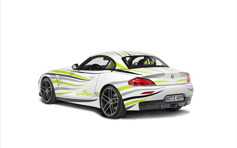 white sports car with green stripes