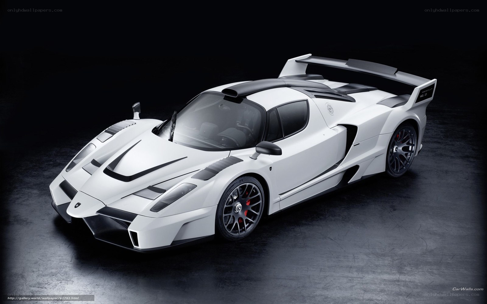 white sports car with large wing
