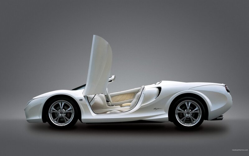 white sports car with open door