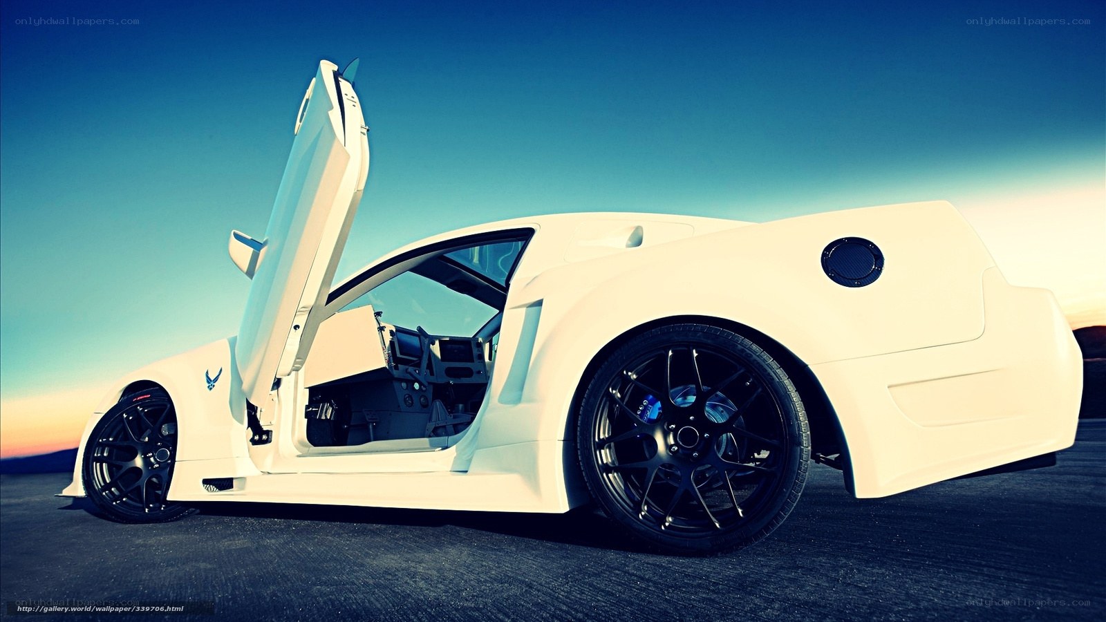 white sports car with open door