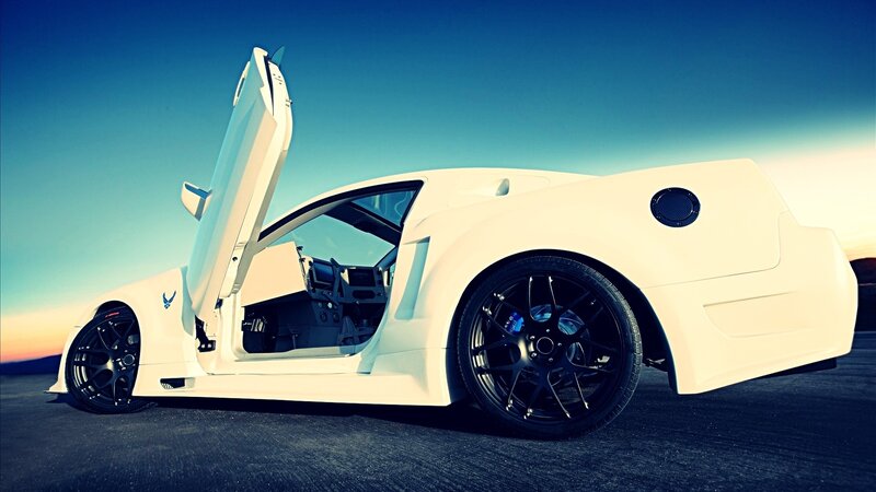 white sports car with open door