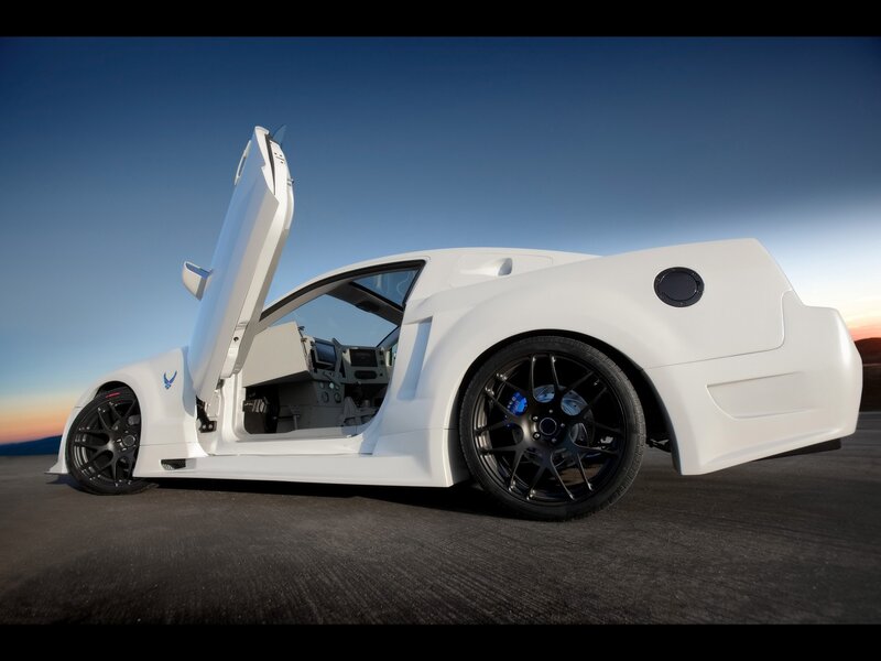 white sports car with open door