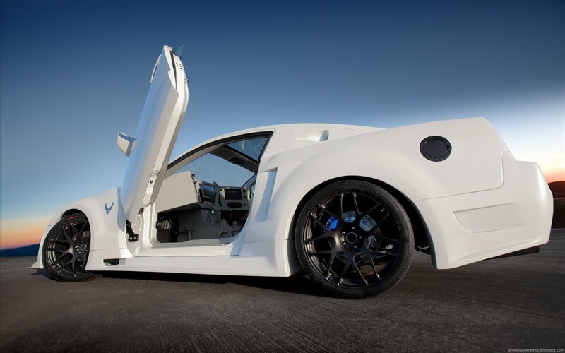 white sports car with open door