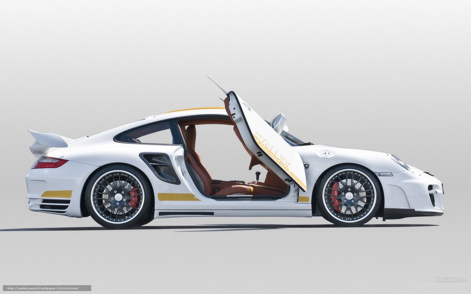 white sports car with open door