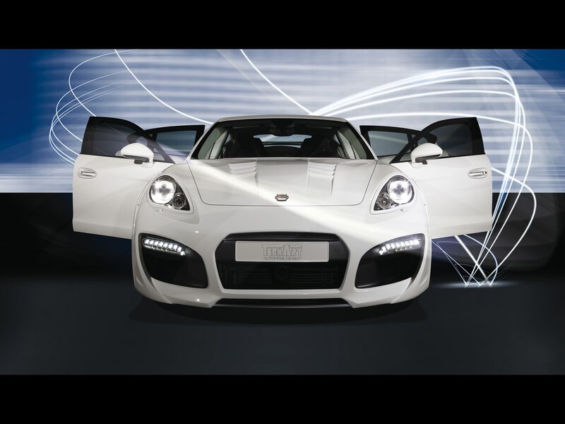 White sports car with open doors