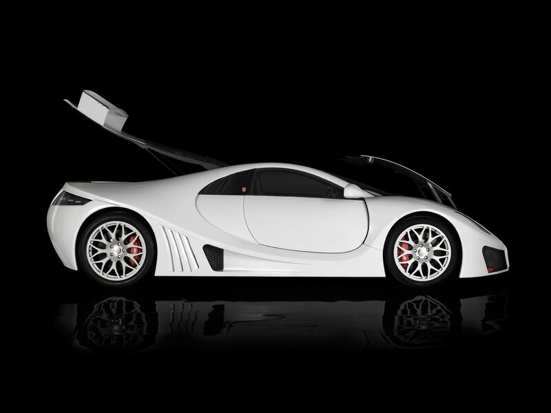 white sports car with open doors
