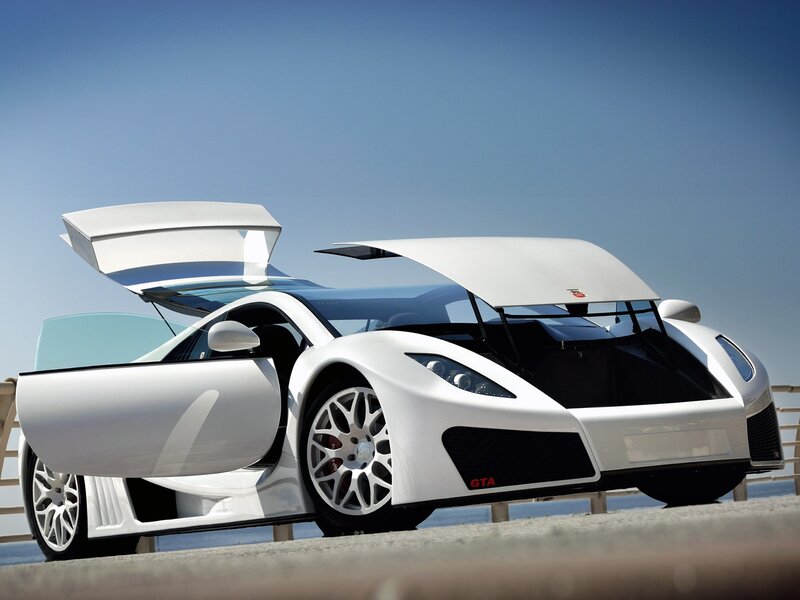White sports car with open doors