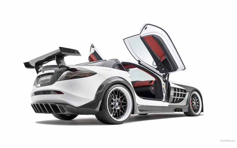 white sports car with open doors