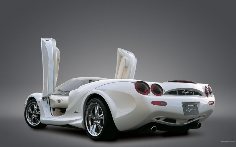 white sports car with open doors