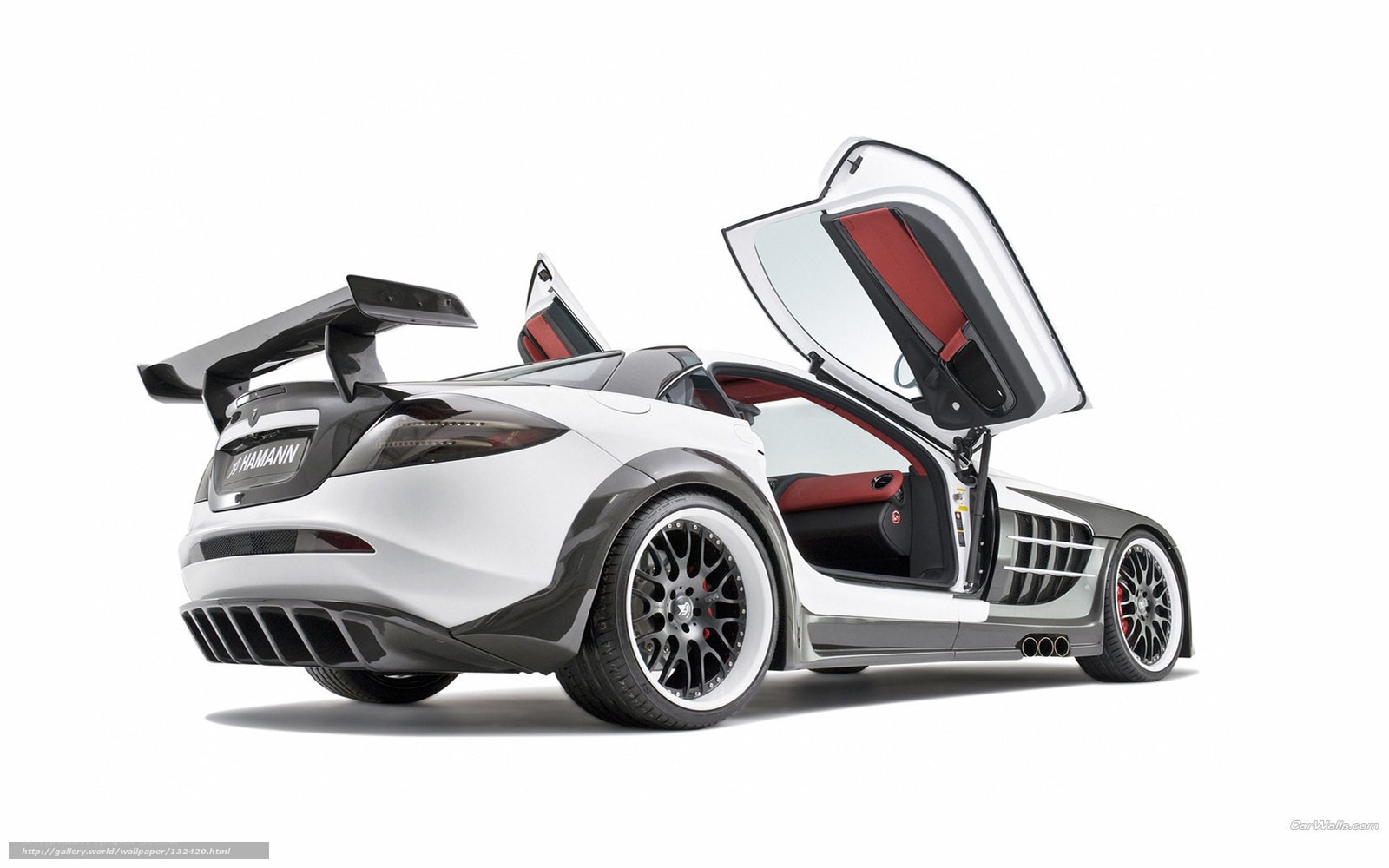 white sports car with open doors