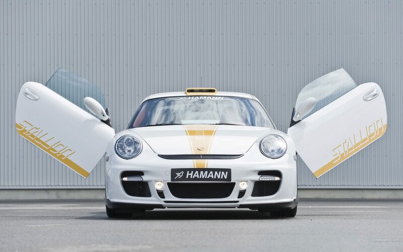 white sports car with open doors