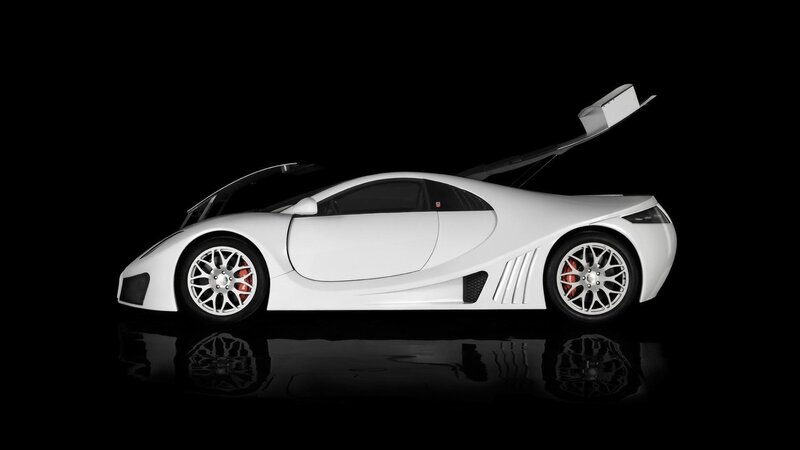 white sports car with open doors