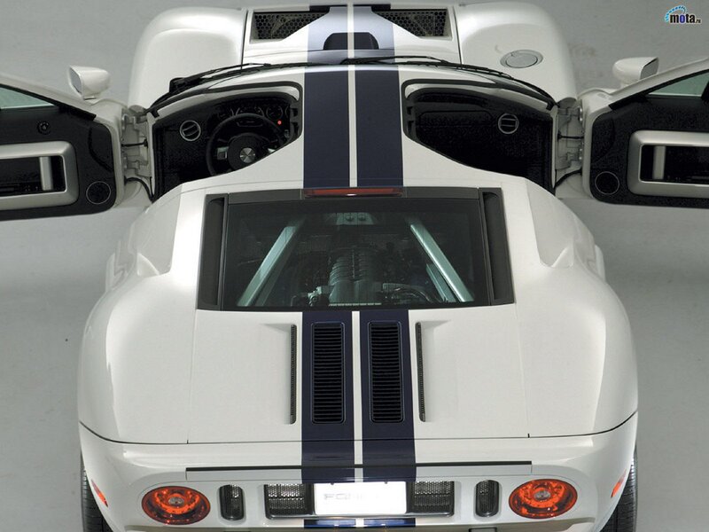 white sports car with open doors