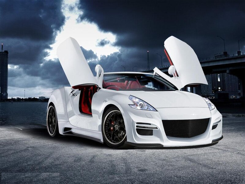 White sports car with open doors