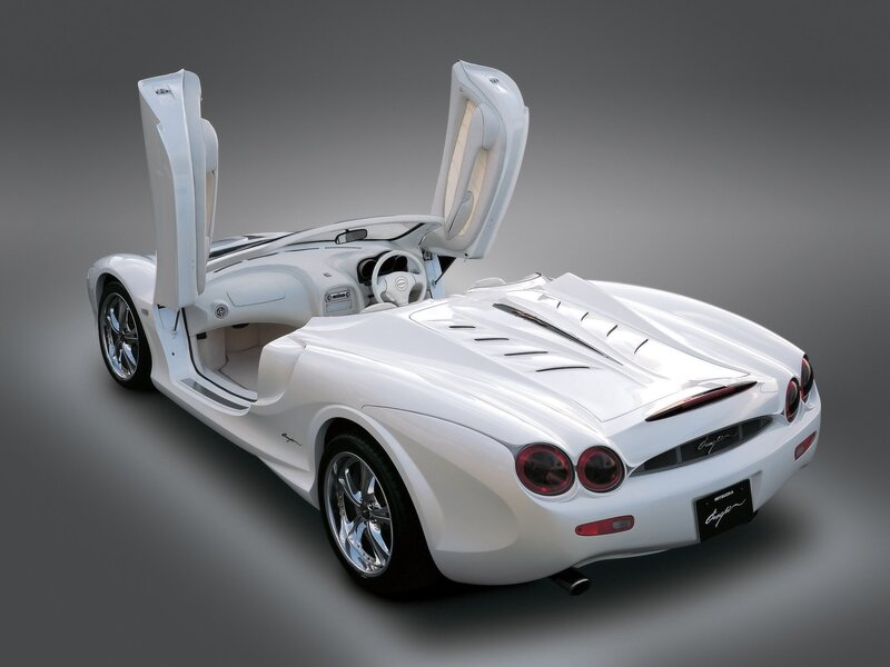 White sports car with open doors