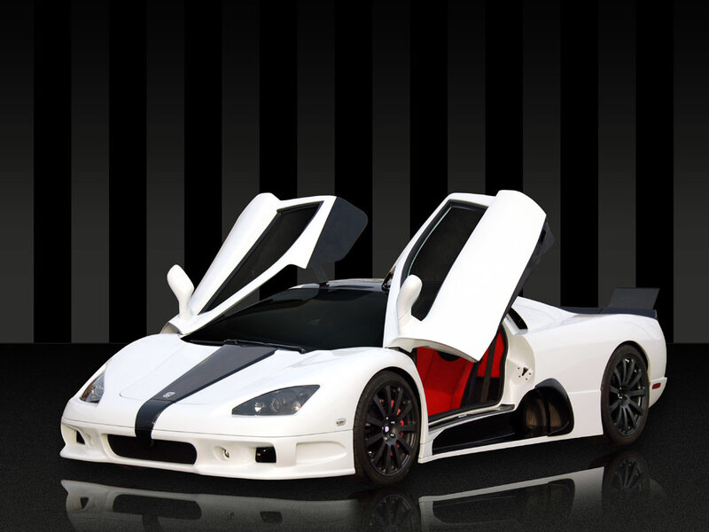 white sports car with open doors