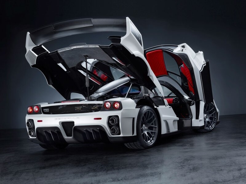 white sports car with open doors